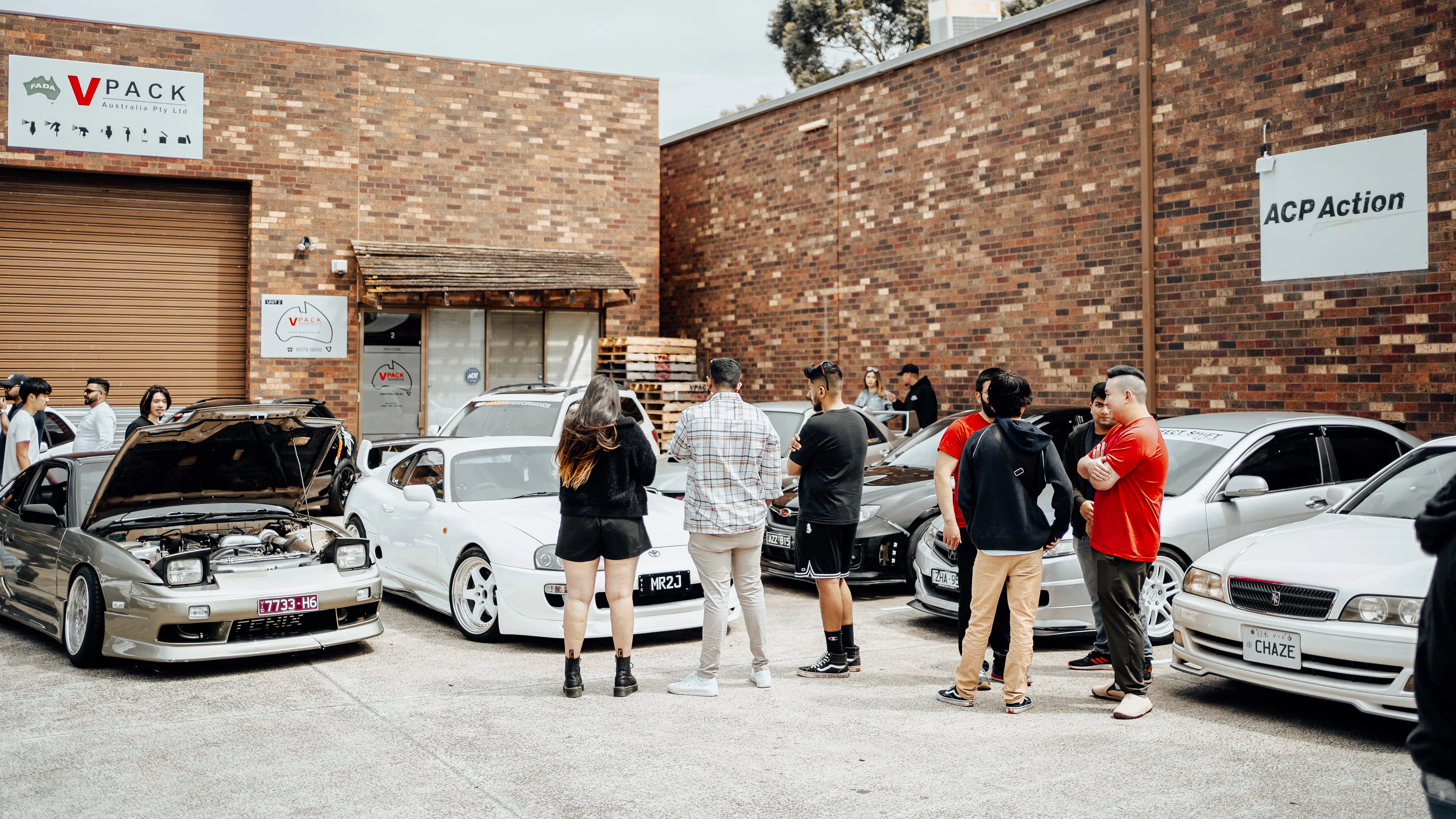 Car enthusiasts gathered at a Wangan Performance community meet in Melbourne