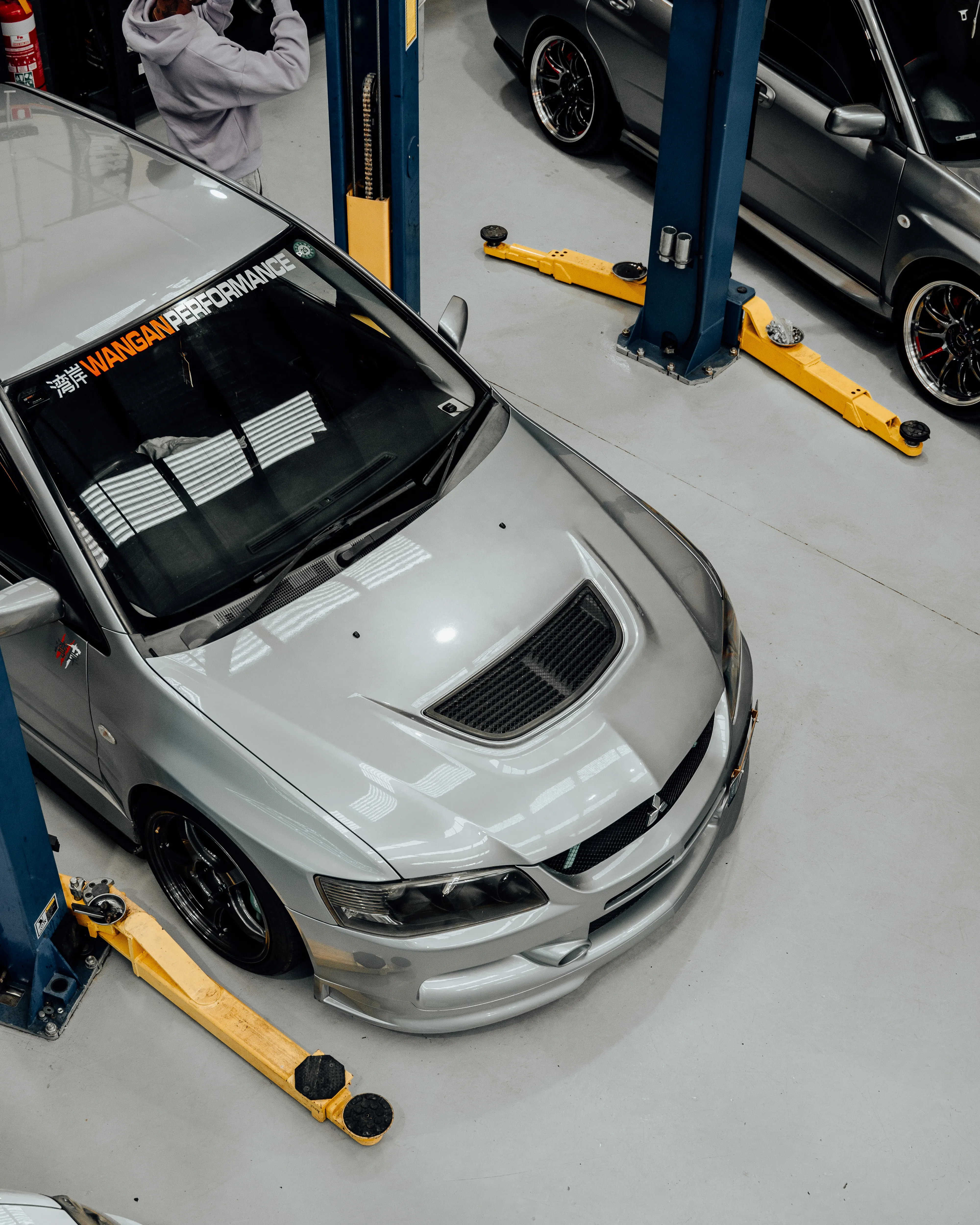 Overhead view of Mitsubishi Evo with Wangan Performance windscreen banner